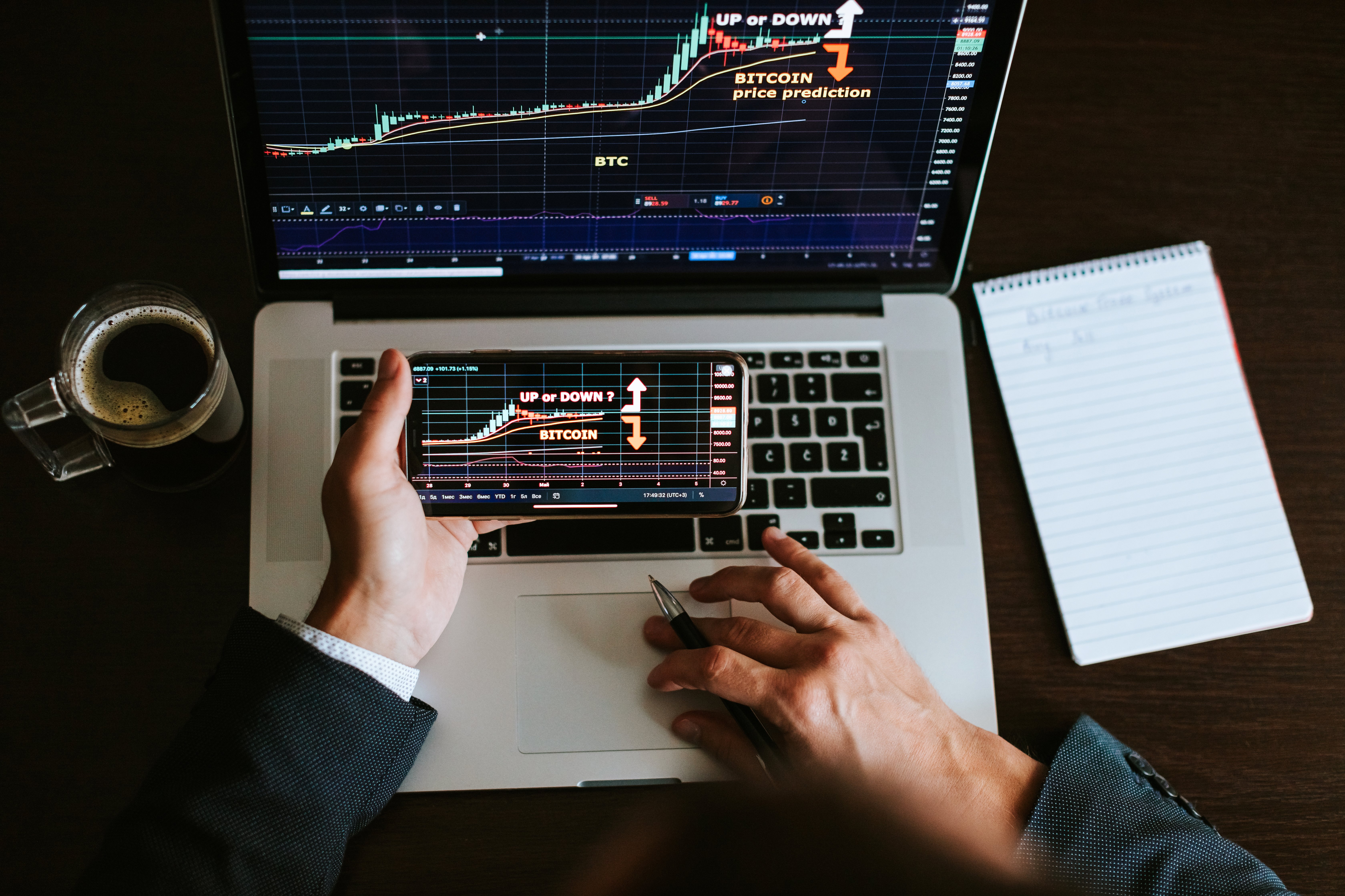 stock-market-trader-analyzing-bitcoin-price-trend-WRQ3E2H